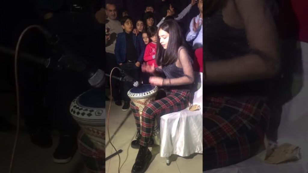 Maria Abulashvili playing drum